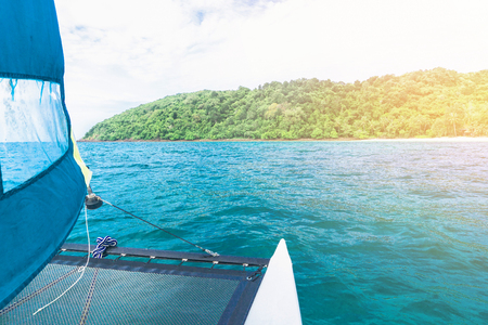 POV shot of traveling to island by Sailboatの写真素材