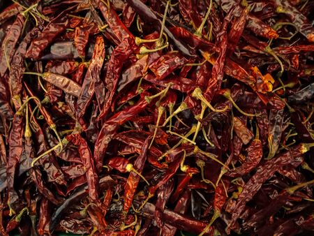 Top view Pile Thai dry red chili pepper for background