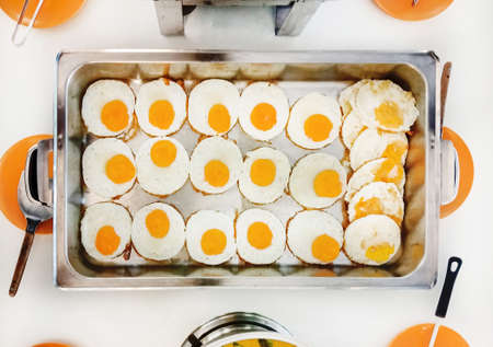 Top view, Group of many Fried egg in aluminium tray
