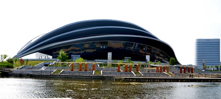 Exterior view of an architectural building by a lakeのeditorial素材