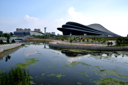 Exterior view of architectural buildings by a lakeのeditorial素材