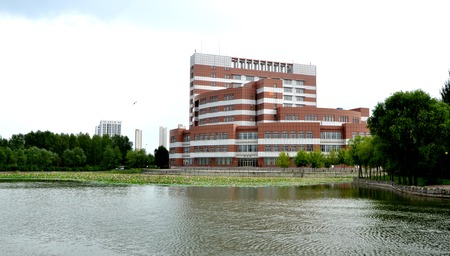 Exterior view of an architectural building by a lotus lakeのeditorial素材