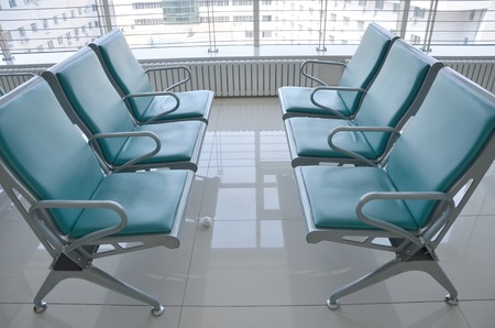 Seats in a hospital corridorの写真素材