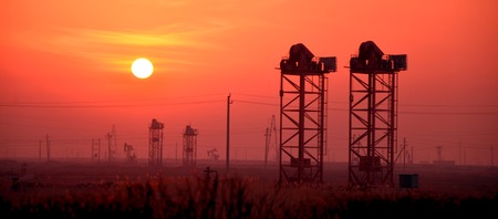 Silhoutte of oil construction sites