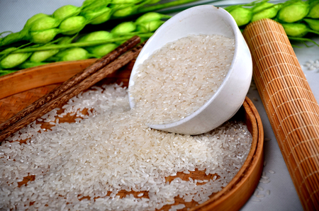 Rice and bowl in a woven trayの写真素材