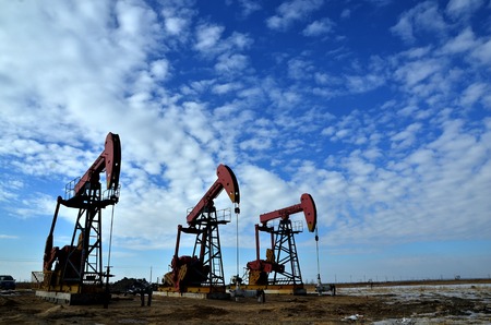 Pumping unit in Daqing oil field landscapeのeditorial素材