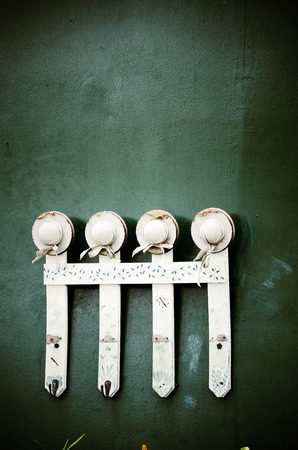 Small wooden fence, wall green backgroundの写真素材