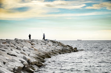 Small stone breakwater in the sea