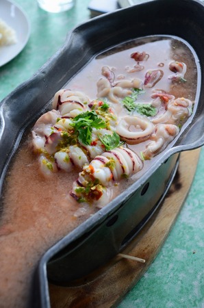 Squid egg steamed in Lemon sauceの写真素材