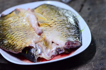two carp fillets ,selective focus at bells