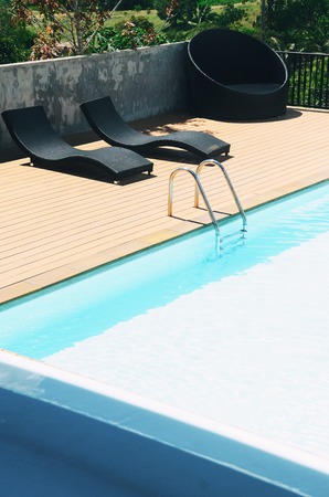 Swimming pool with stair at hotel close upの写真素材