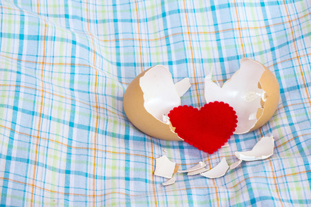 Eggshel and heartの写真素材