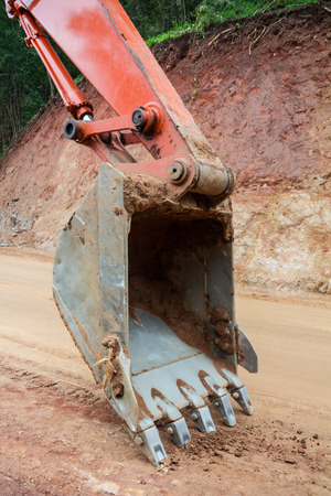 Heavy earth mover at construction siteの写真素材