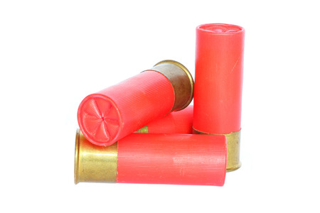 Red shotgun ammo on white background