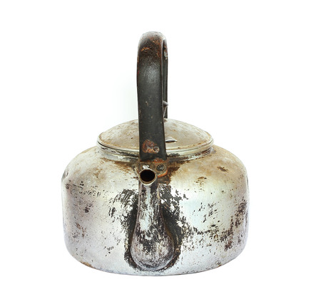 Old kettle on a white background