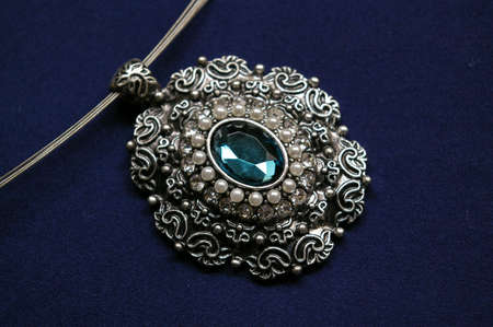 Closeup of a vintage pendantの写真素材