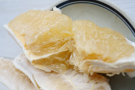 Fruit grapefruit pulp peel white backgroundの写真素材