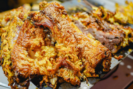 Roasted whole lamb, golden barbecue deliciousの写真素材