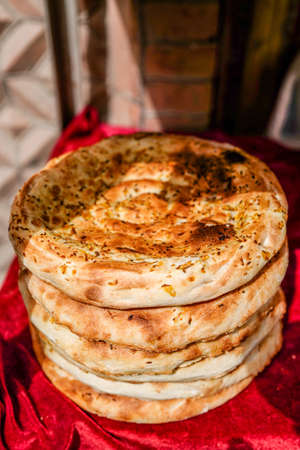 Yellow roasted naan, folk delicacy pastaの写真素材