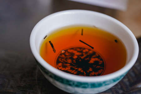 Copper kettle and drink black tea on restaurant tableの写真素材