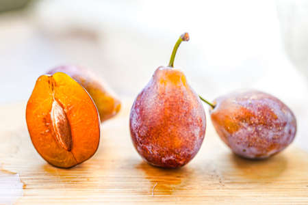 Indoor studio fresh prunes close-upの写真素材