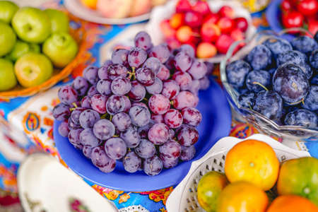 Purple grapes from street vendorsの写真素材