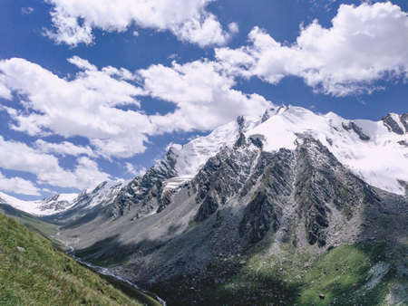 Blue sky and white clouds Himalayas snow mountain sceneryの写真素材