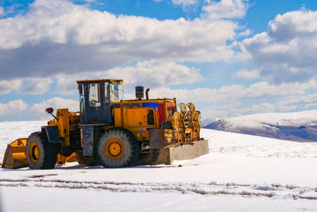 Winter scenery snow mountain road glacier, snow plow