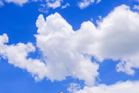 Sunny weather, blue sky and white cloudsの写真素材