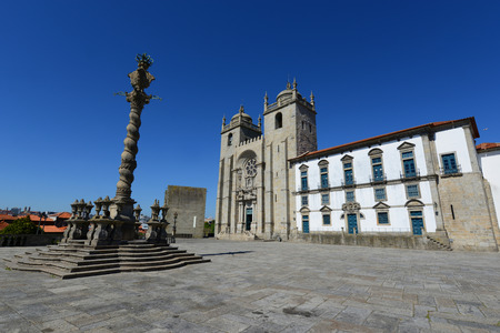 The Porto Cathedral (Portuguese: Se do Porto) and Manueline Pillory at Terreiro da Se, Porto,...