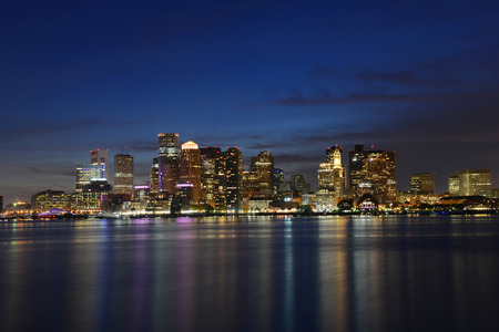 Boston City Skyscrapers, Custom House and Boston Waterfront at night from East Boston, Boston, Massachusetts, USAの写真素材