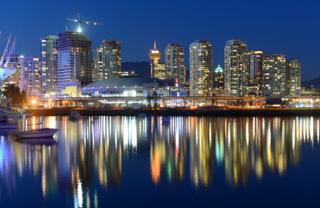 Vancouver City skyline and Rogers Arena at night, Vancouver, British Columbia, Canadaの写真素材