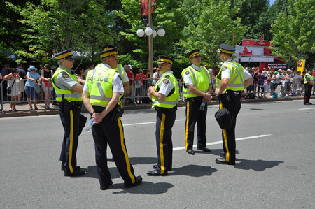 OTTAWA, CANADA - JULY 1: RCMP police on guard on Canada Day on July 1, 2011 in Ottawa, Ontario, Canada.のeditorial素材