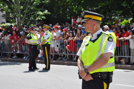OTTAWA, CANADA - JULY 1: RCMP police on guard on Canada Day on July 1, 2011 in Ottawa, Ontario,...