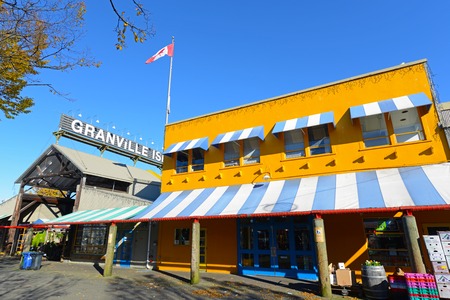 Historic workshop buildings on Johnston Street on Granville Island in Vancouver, British Columbia, Canada.のeditorial素材
