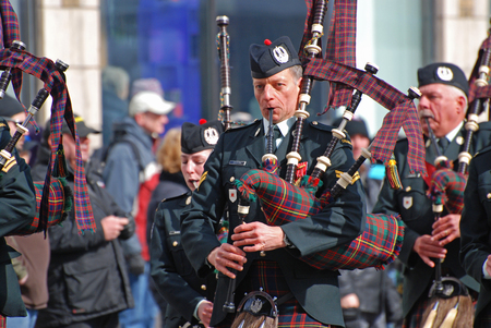 OTTAWA, CANADA - MAR. 10, 2012: Military Bagpipers in Saint Patrick's Day Parade in Ottawa, Ontario,...
