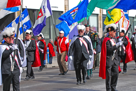 OTTAWA, CANADA - MAR. 10, 2012: People in Saint Patrick's Day Parade in Ottawa, Canada.のeditorial素材