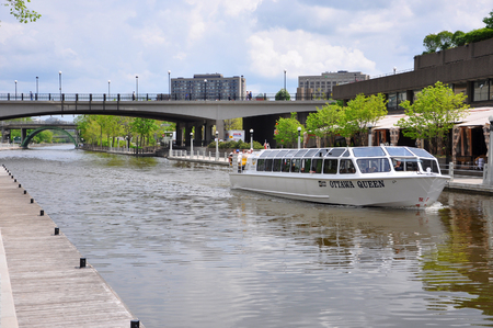 Ottawa Queen cruise ship on Rideau Canal in downtown Ottawa, Ontario, Canada. Rideau Canal was registered as a UNESCO World Heritage Site.のeditorial素材