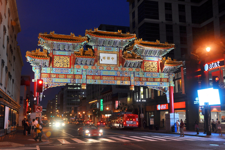 The Friendship Archway spanning H Street in the heart of Chinatown at night, Washington DC, USA.のeditorial素材