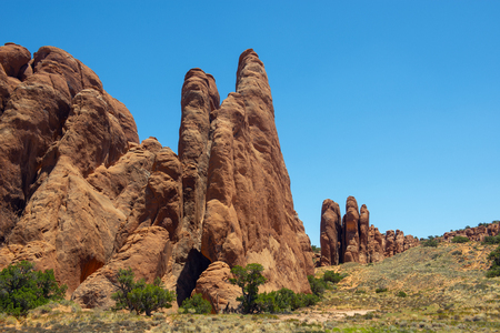Mesa and Butte landscape at Sand Dune Arch in Arches National Park, Moab, Utah, USA.の写真素材