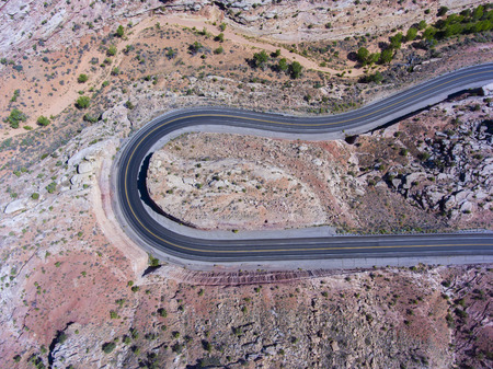 Mesa and canyon landscape and Utah State Route 313 aerial view near Arches National Park, Moab, Utah, USA.の写真素材
