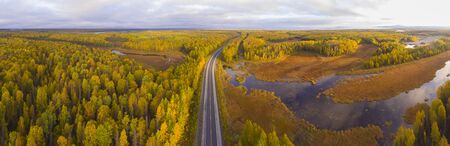 Alaska Route 3 aka George Parks Highway and Alaska landscape aerial view in fall with the morning sun light, at the south of Denali State Park at Susitna North, Alaska AK, USA.の写真素材
