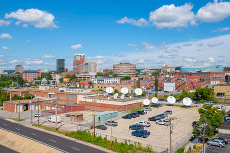 Manchester modern city skyline including City Hall Plaza, Brady Sullivan Plaza building and SNHU Arena in downtown Manchester, New Hampshire NH, USA.のeditorial素材