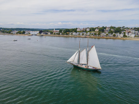 Aerial view of Schooner Thomas E. Lannon sails in Gloucester Harbor in Gloucester city, Cape Ann, Massachusetts MA, USA.の写真素材