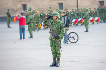 Raising Flag Guard of Honor standing on Zocalo at Historic center of Mexico City CDMX, Mexico. Historic center of Mexico City is a UNESCO World Heritage Site since 1987.のeditorial素材