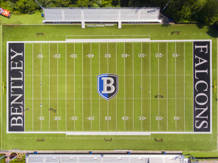 Bentley University Dana Athletic Center and Bentley Falcons football court aerial view in city of Waltham, Massachusetts MA, USA.のeditorial素材