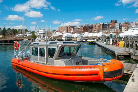 East Boston Coast Guard 25-Foot Defender Class Boat docked at pier in the station in East Boston, Massachusetts MA, USA.のeditorial素材