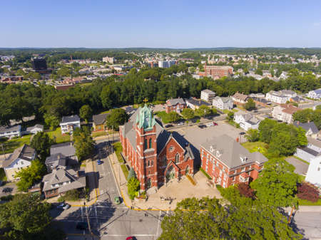 Woonsocket Precious Blood Church aerial view in downtown Woonsocket, Rhode Island RI, USA. This church is a historic Roman Catholic Church built in 1873 on 94 Carrington Avenue.の写真素材