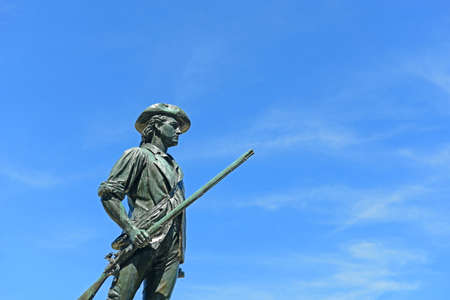 Minute Man Statue at North Bridge in Minute Man National Historic Park in historic town center of Concord, Massachusetts MA, USA.の写真素材