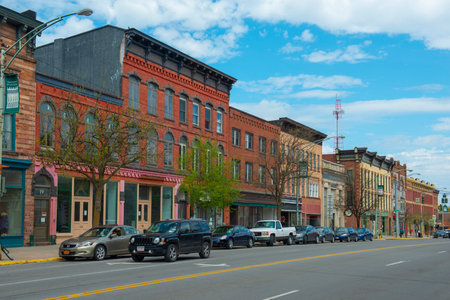 Historic sandstone and brick commercial buildings with Italianate style on Market Street at Main Street in downtown Potsdam, Upstate New York NY, USA.のeditorial素材